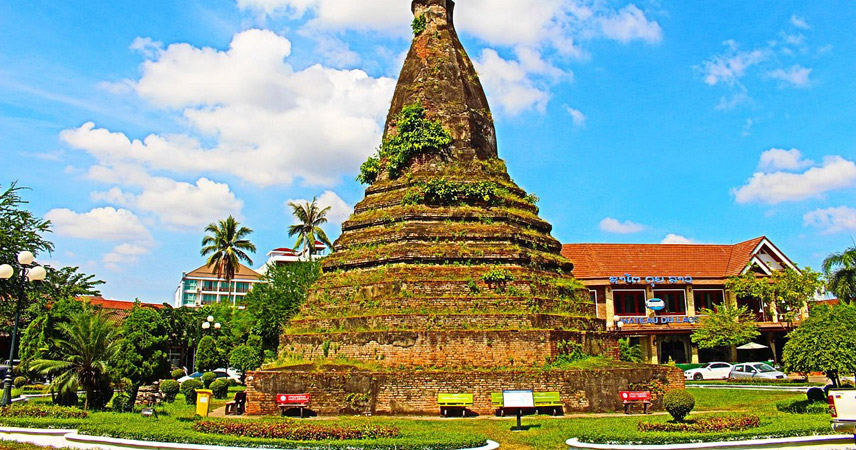 That Dam, or Black Stupa, stands quietly at a traffic circle in central Vientiane