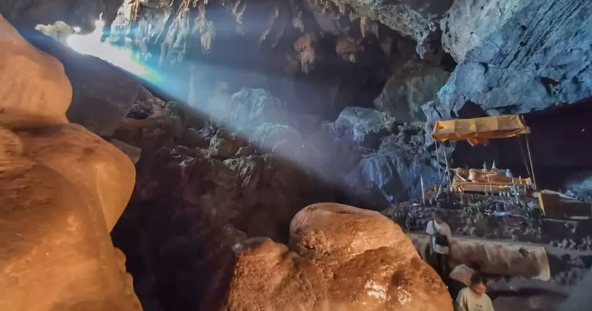 Visitors visit the magnificent caves in Vang Vieng