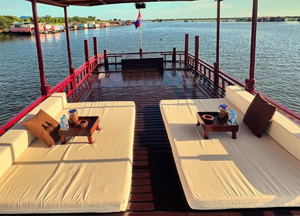 enjoy a relaxing boat ride on the Tonle Sap Lake to see the famous floating villages