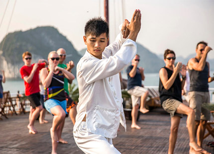 relaxing Tai Chi session on the sun terrace to start your day